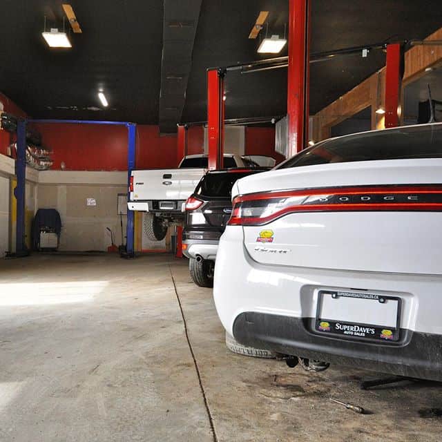 Professional vehicle inspection at Super Dave's Auto Sales licensed garage in Dartmouth